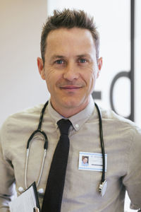 Portrait of smiling doctor at hospital