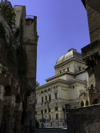 Low angle view of old building against clear sky