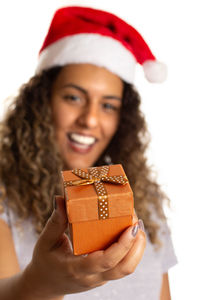 Close-up portrait of a smiling young woman