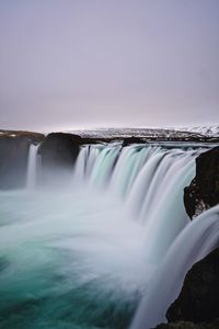 View of waterfall against sky