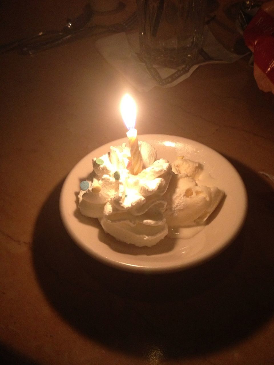 indoors, burning, flame, heat - temperature, fire - natural phenomenon, glowing, illuminated, candle, close-up, food, lit, fire, high angle view, table, no people, food and drink, still life, night, light - natural phenomenon, selective focus