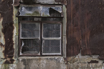 Closed window of old building