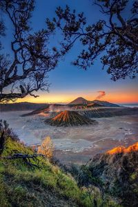 Scenic view of landscape against sky during sunset