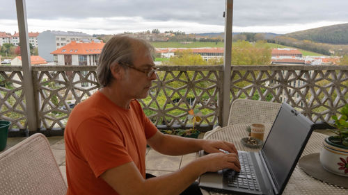 Middle-aged man working on a computer