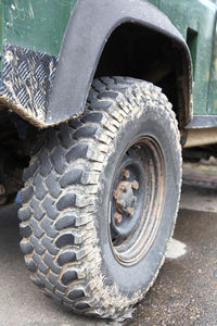 Close-up of tire on road