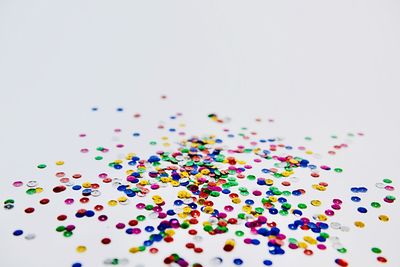 High angle view of multi colored candies on table