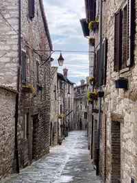 Street amidst buildings in a old italian town