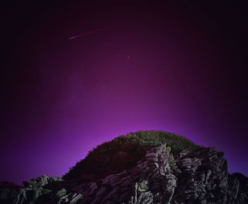 Scenic view of star field against sky at night