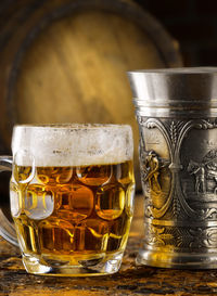 Close-up of beer glass on table