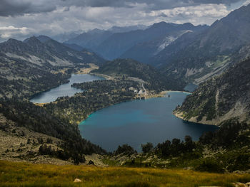 High angle view of calm lake against mountain range