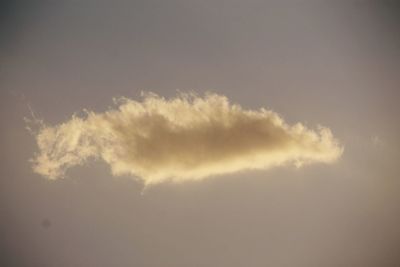 Low angle view of cloudy sky at sunset