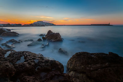 Scenic view of sea against sky during sunset