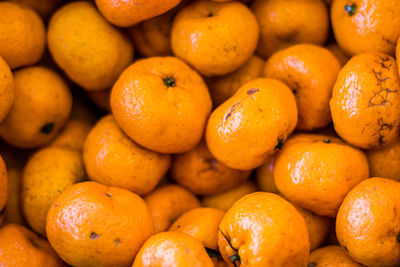 Full frame shot of oranges at market stall