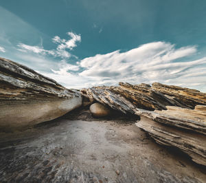 Scenic view of rocks against sky