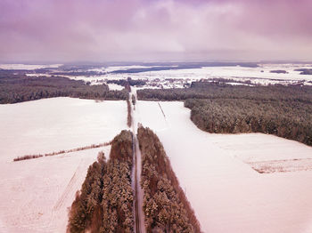 Scenic view of sea against sky during winter