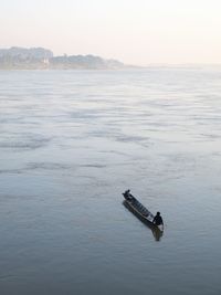 High angle view of boat in sea against sky