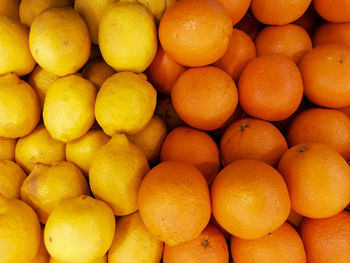 Full frame shot of oranges in market