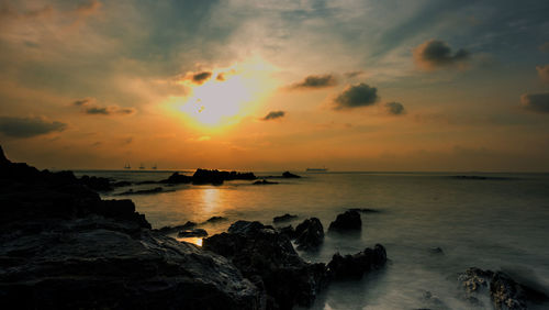 Scenic view of sea against sky during sunset