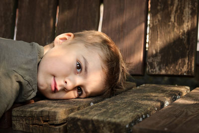 Portrait of little adorable boy. cute child, dreaming, thinking about something beautiful brown eyes