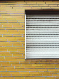 Closed window on wall of building