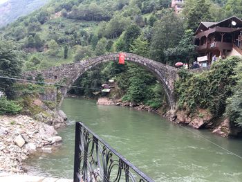 High angle view of bridge over river in forest