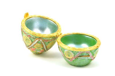 High angle view of decoration on table against white background