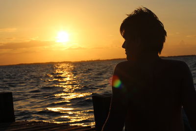Scenic view of sea at sunset