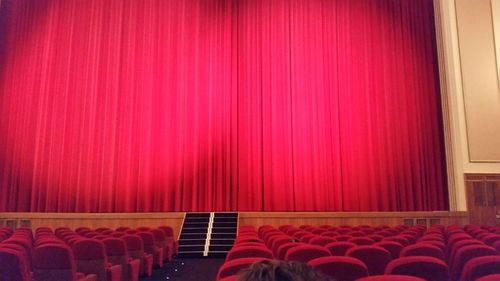 Red chairs in room