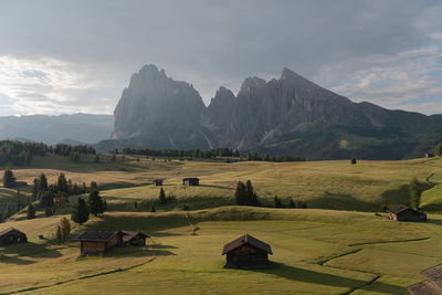 Scenic view of landscape and mountains against sky