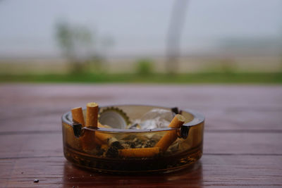 Close-up of cigarette on table