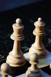 High angle view of pieces on chess board
