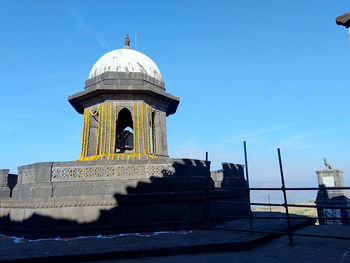 View of temple building against sky