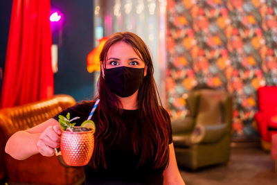 Portrait of woman wearing mask