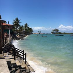 Scenic view of sea against clear blue sky