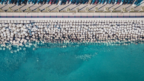 Aerial view of cement cube blocks protecting the shore from the