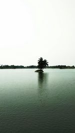 Scenic view of lake against clear sky