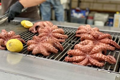 Cropped hand preparing food