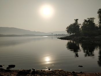 Scenic view of lake during sunset