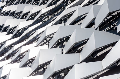 Low angle view of umbrellas on paper against white background