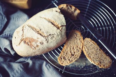 High angle view of sourdough bread on cooling tray