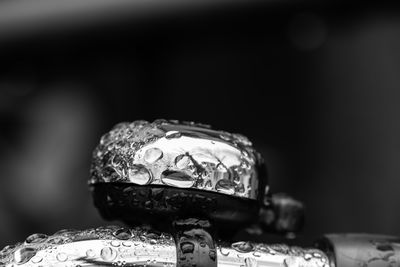 Close up bike bell in rain