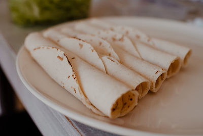 Close-up of bread in plate on table