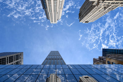 Directly below view of modern skyscrapers in manhattan