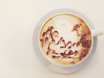 High angle view of coffee cup on table