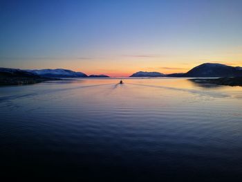 Scenic view of lake during sunset