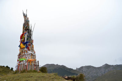 Traditional windmill against sky