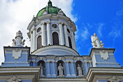 Low angle view of temple against cloudy sky