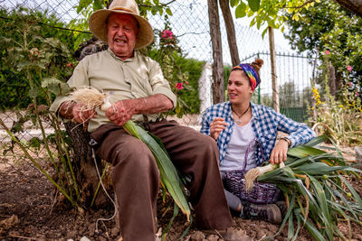 Friends sitting in garden