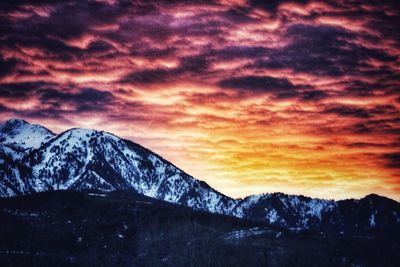 Scenic view of mountains against sky during sunset