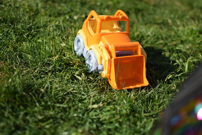 High angle view of toy car on field